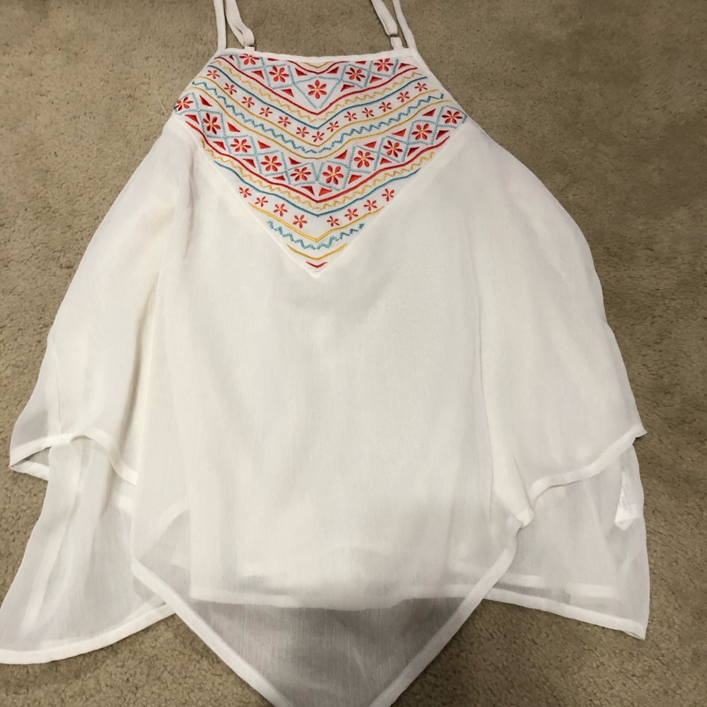 White flowy halter top with floral accents